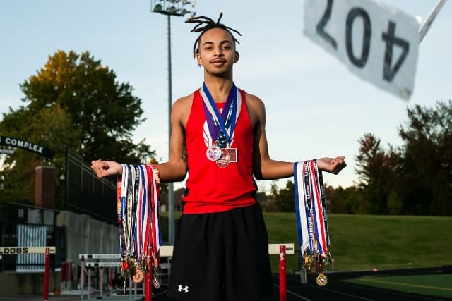 Deverin King with medals on track